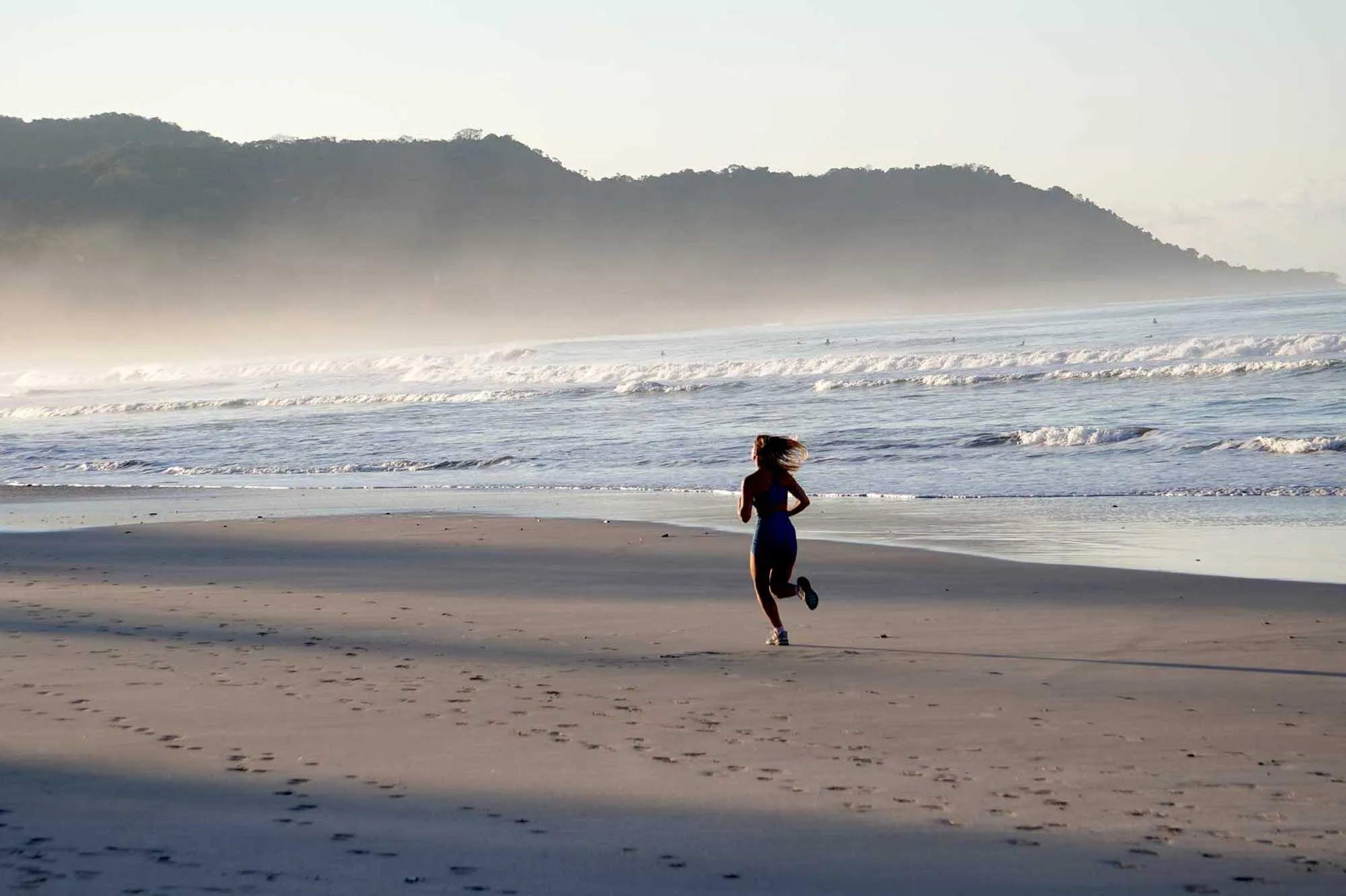 Woman running on the beach
