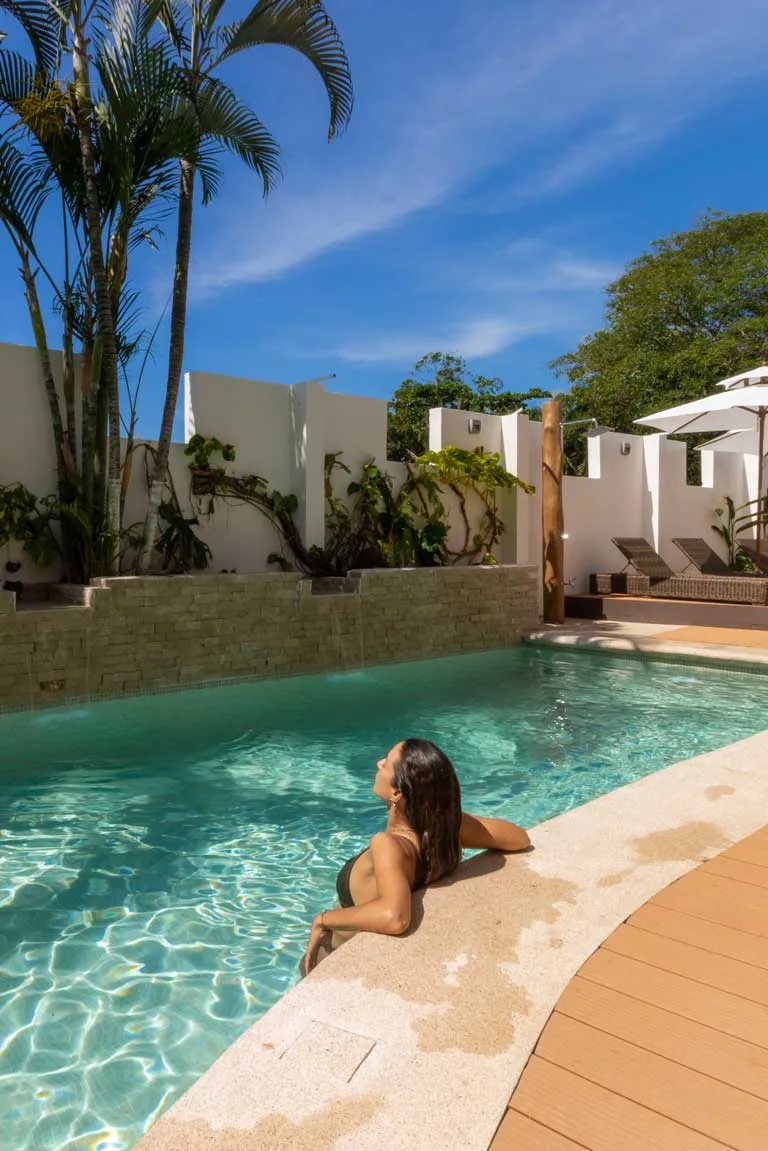Guest relaxing in the hotel swimming pool